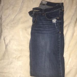 Hollister distressed bootcut jeans.